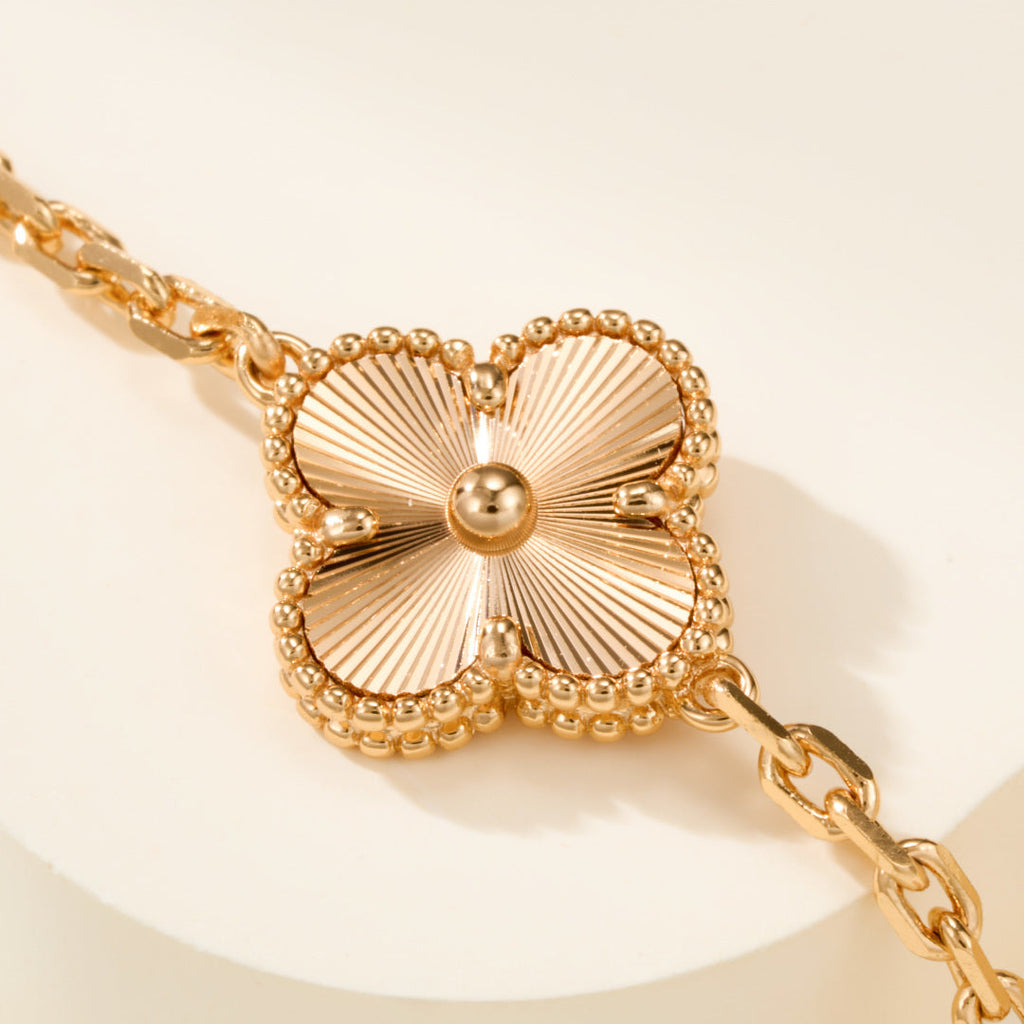 Pink Mother-of-Pearl Five-Motif Bracelet – Faceted Floral Design