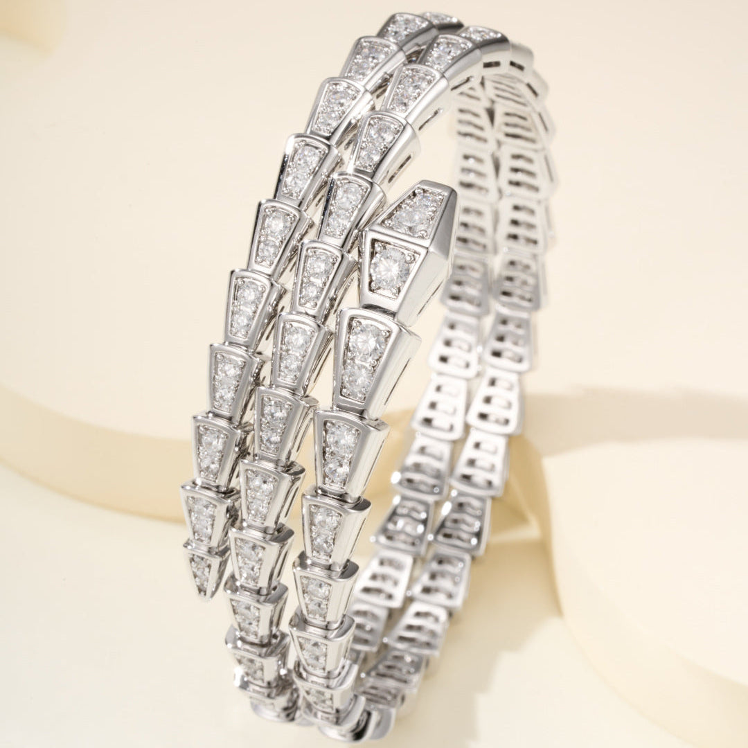 Double-Loop Serpent Bangle with Gemstones – Coiled Snake Design