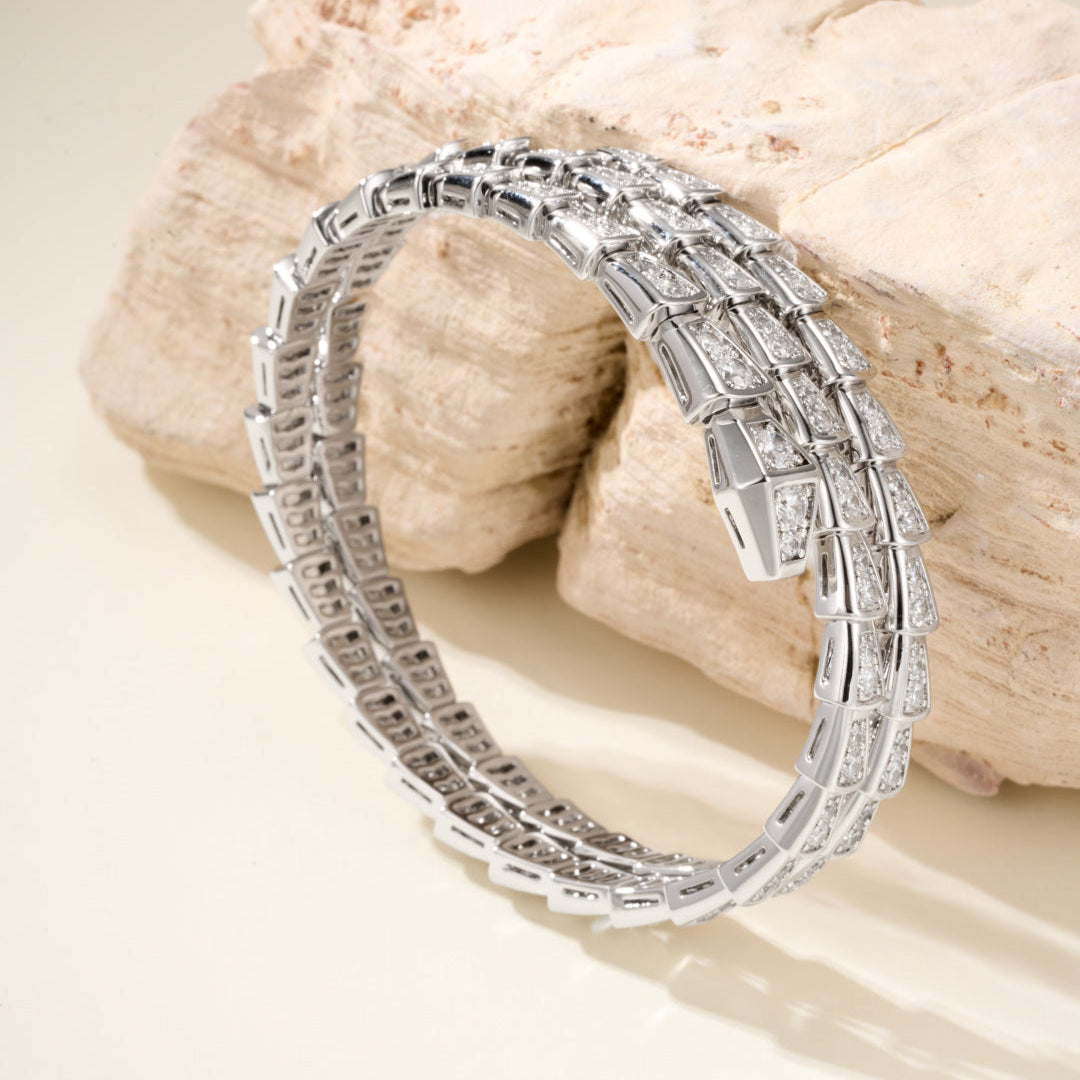 Double-Loop Serpent Bangle with Gemstones – Coiled Snake Design