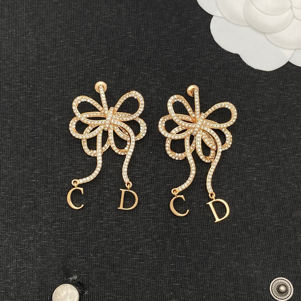 Gemstone-Encrusted Ribbon Bow Earrings with Letter Charms