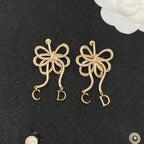 Gemstone-Encrusted Ribbon Bow Earrings with Letter Charms