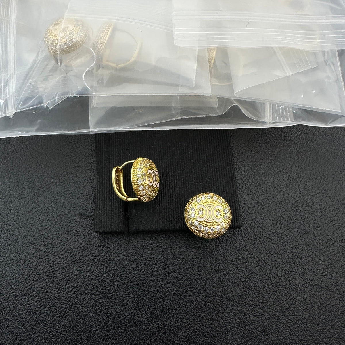 Crystal Pavé Dome Huggie Earrings–Interlocking Arch Motif
