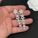 Crystal Pavé Star Linear Drop Earrings–Interlocking C Cascade