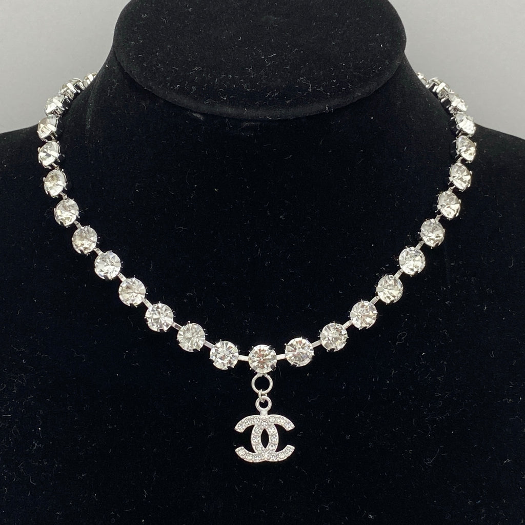 Graduated Crystal Tennis Necklace – Pavé Interlocking C Charm