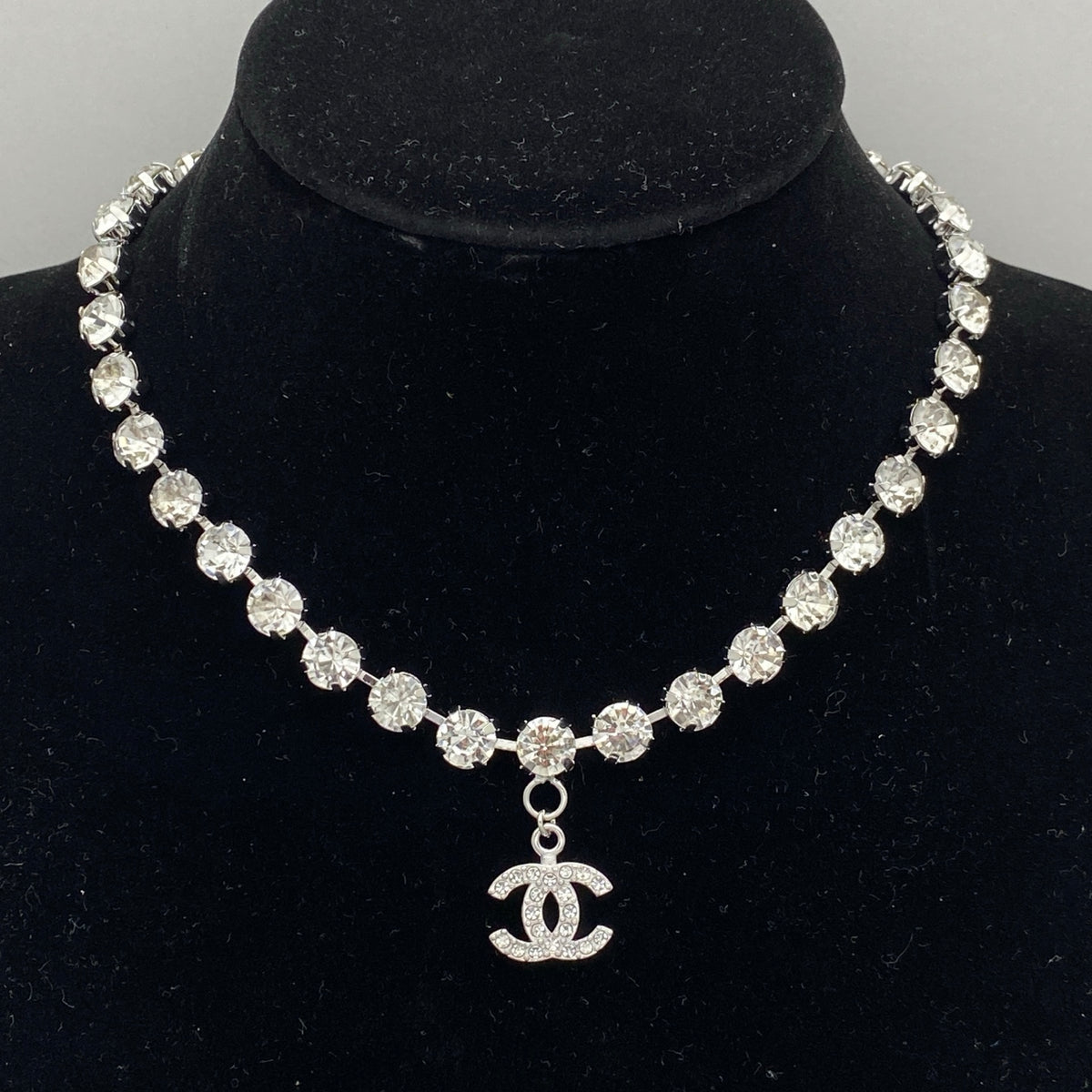 Graduated Crystal Tennis Necklace – Pavé Interlocking C Charm
