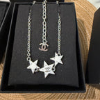 White Enamel Star Necklace – Triple Stars with Interlocking C