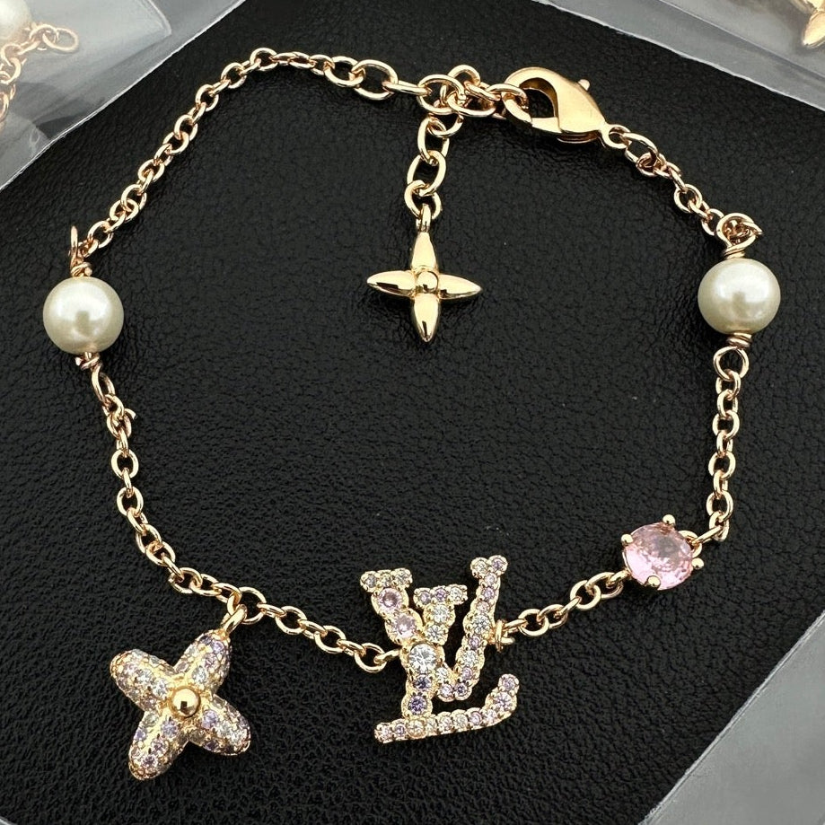 Crystal Pavé Charm Bracelet – Monogram, Flower and Lustrous Beads