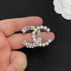 Lustrous Bead Number 5 Brooch – Crystal Starbursts and Flower
