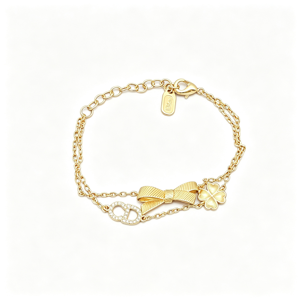 Double Strand Charm Bracelet – Pavé Monogram, Ribbed Bow and Clover