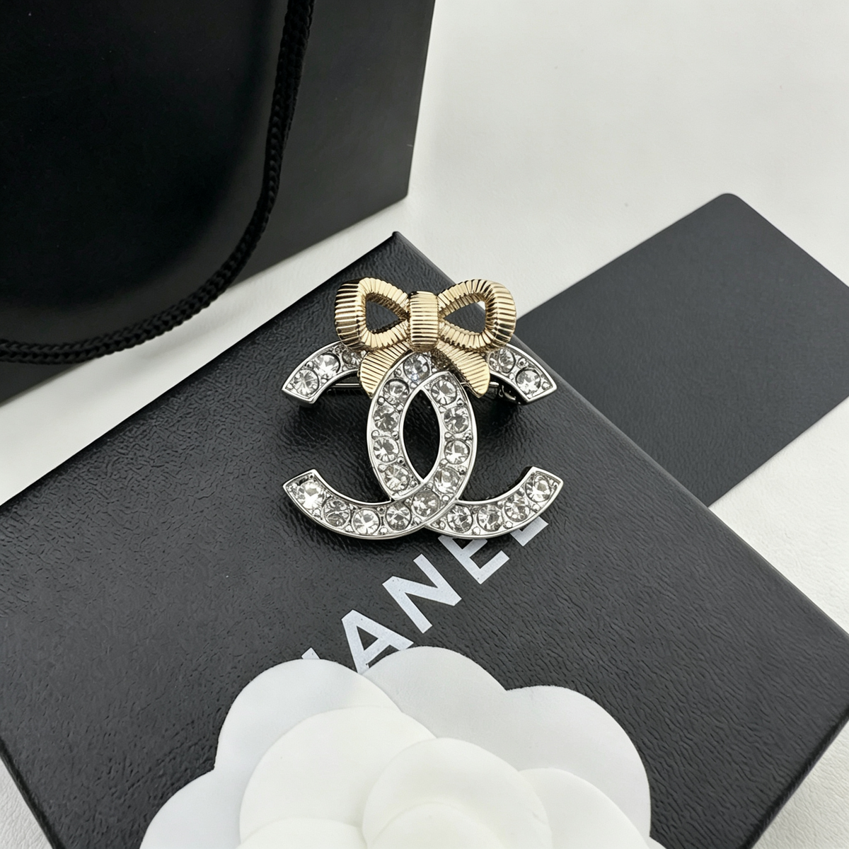 Pavé Interlocking C Brooch – Ribbed Bow Topper