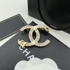 Crystal Interlocking C Brooch – Sculpted Wave Overlay