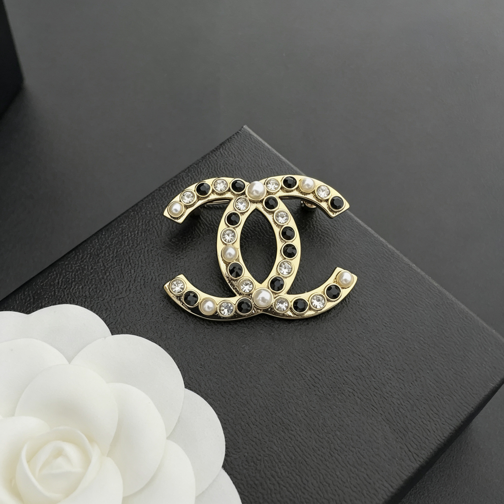 Interlocking C Brooch – Black & Clear Crystals with Lustrous Beads