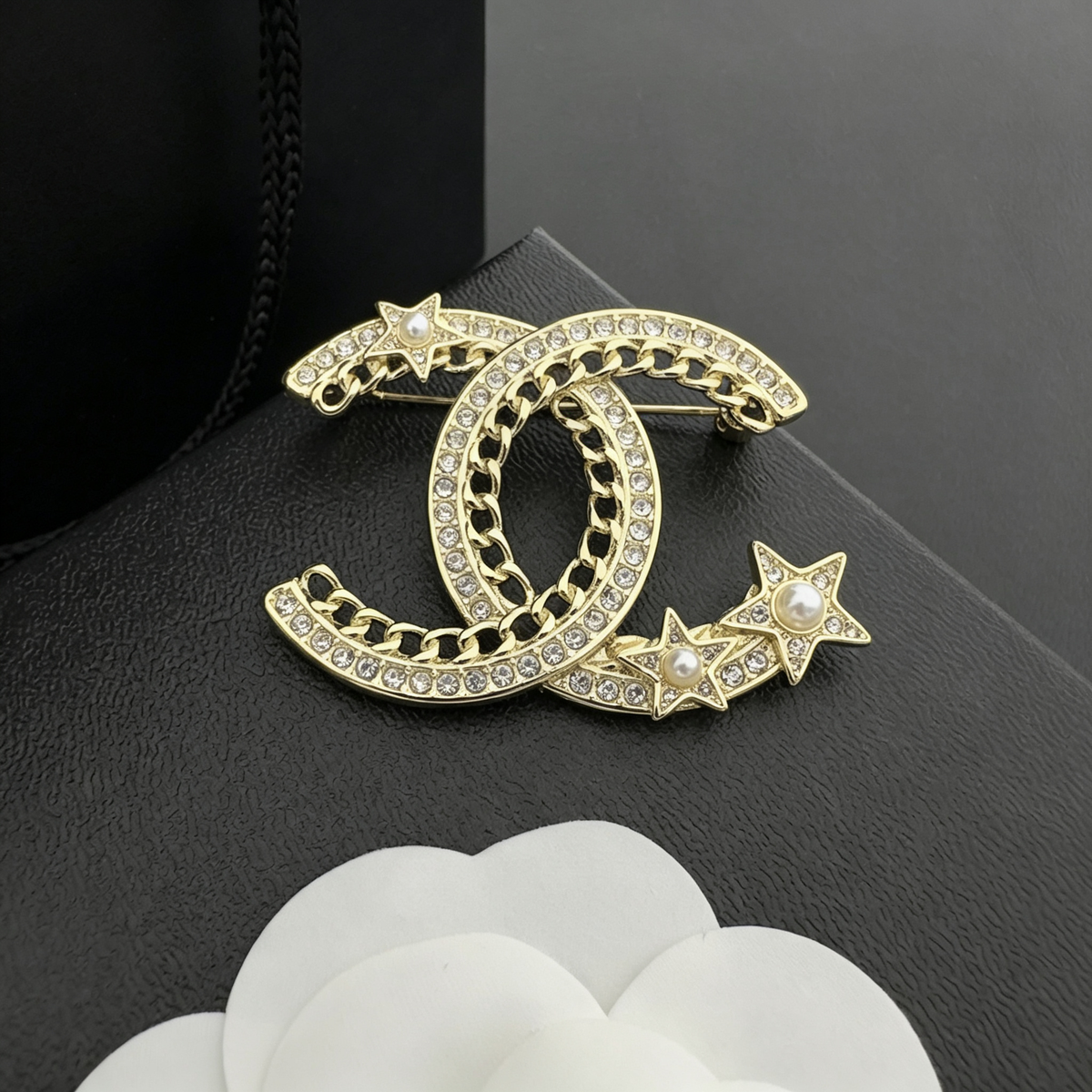 Interlocking C Star Brooch – Chain-Link Crystal