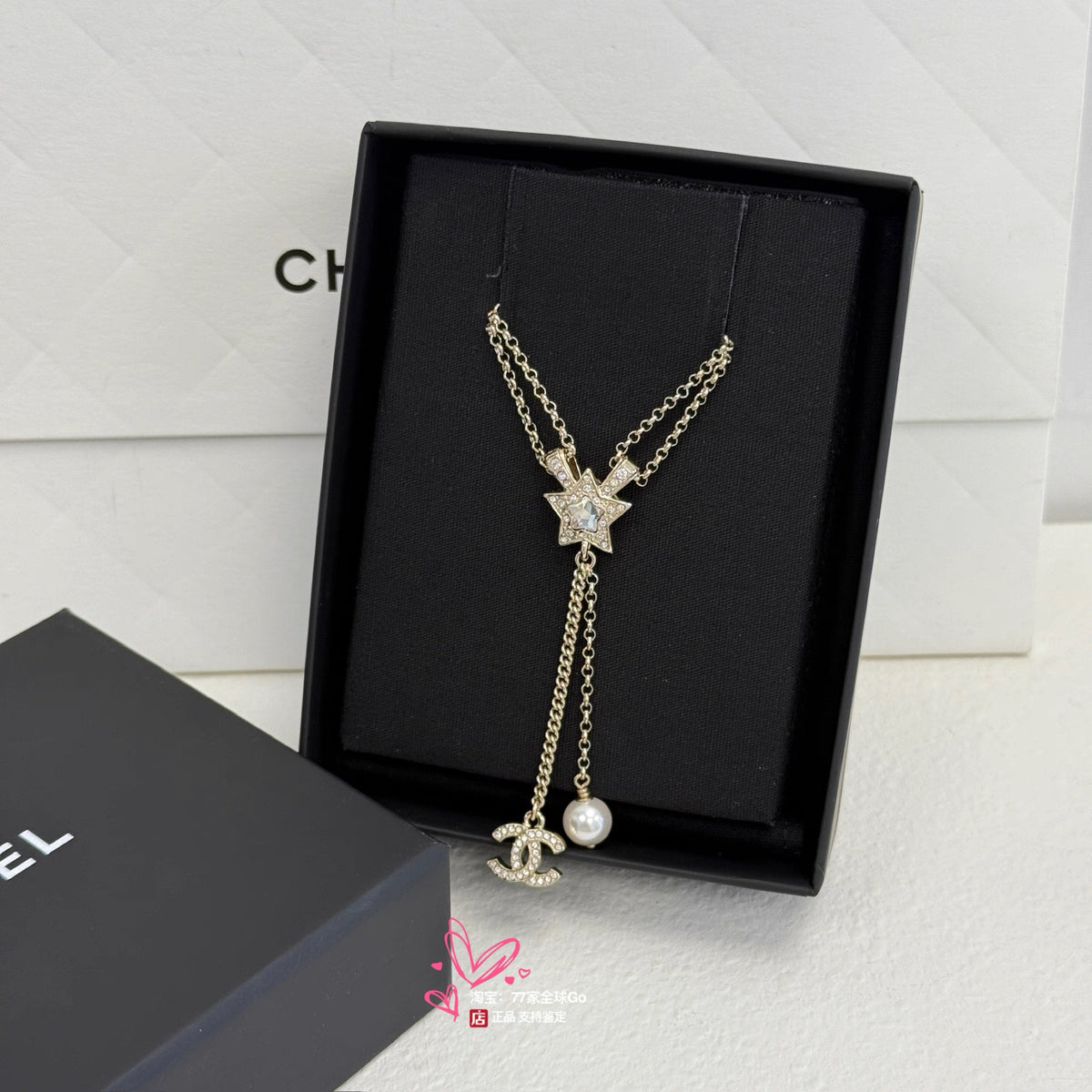 Crystal Pavé Star Lariat Necklace – Interlocking C and Lustrous Bead Drop