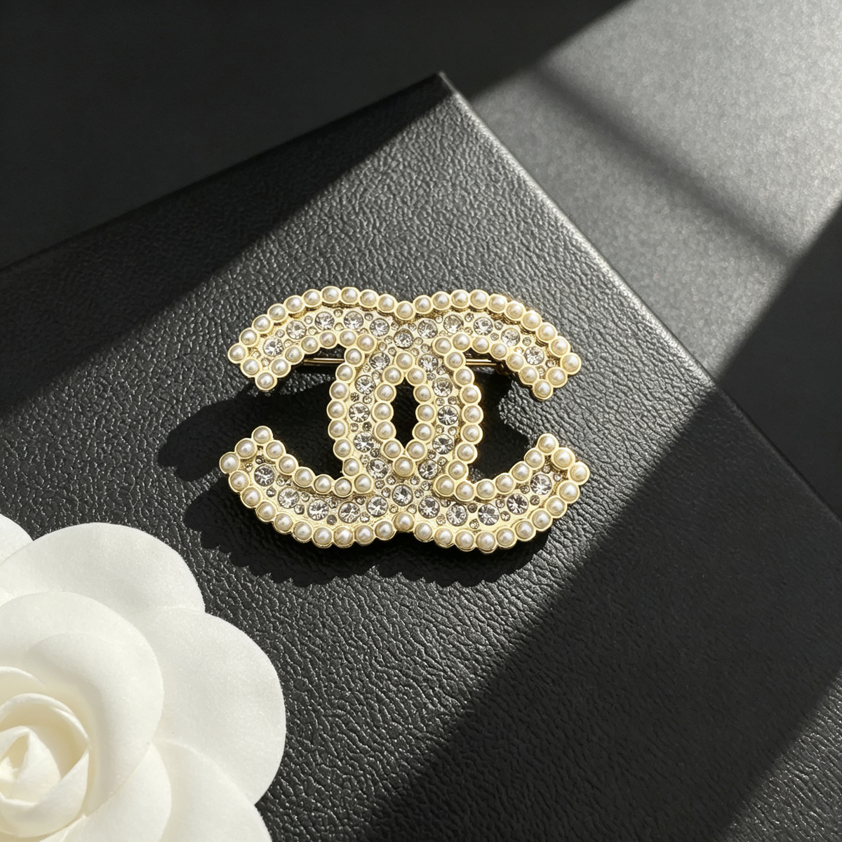 Interlocking C Brooch – Lustrous Bead Edges & Crystal Pavé