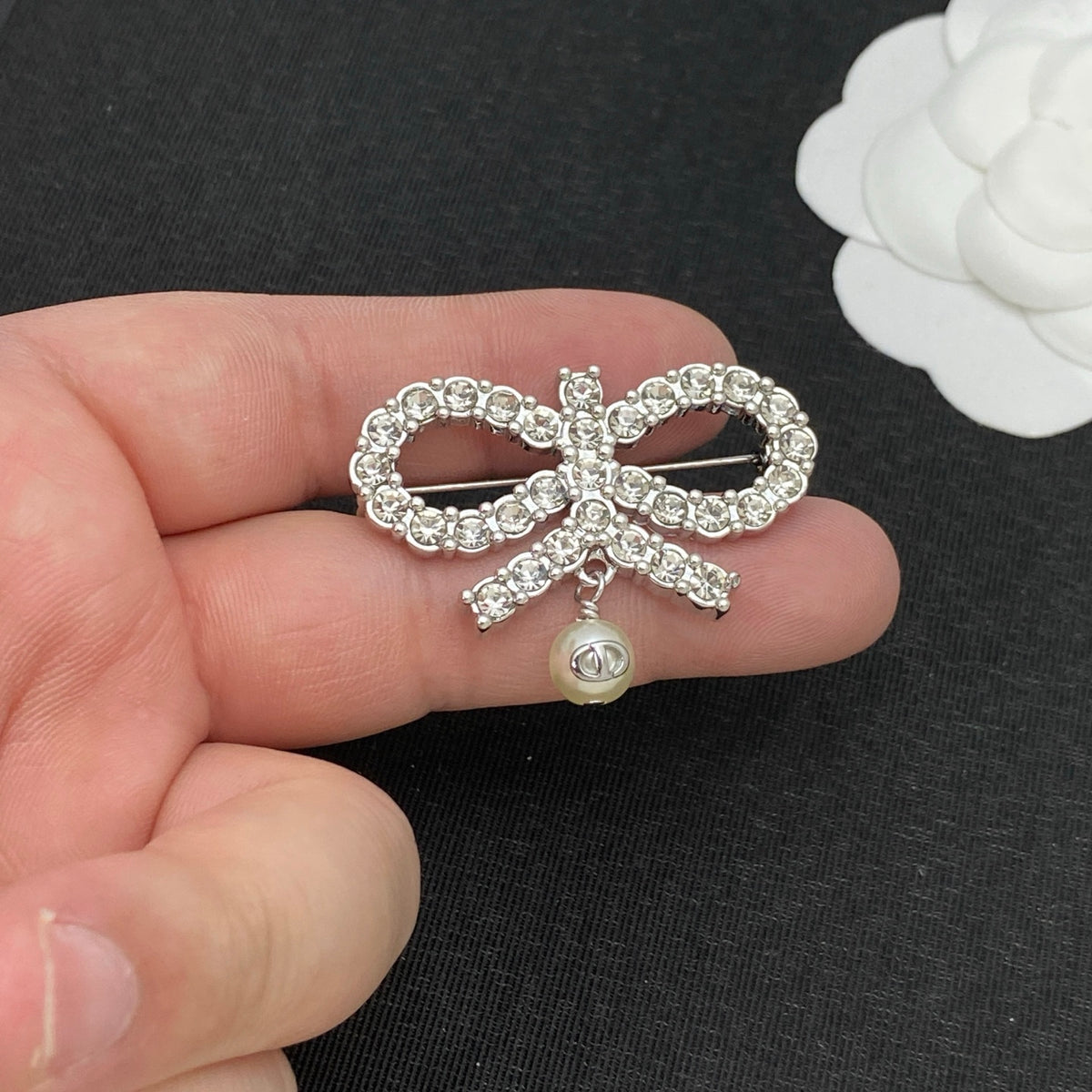 Crystal Bow Brooch with Lustrous Bead Drop