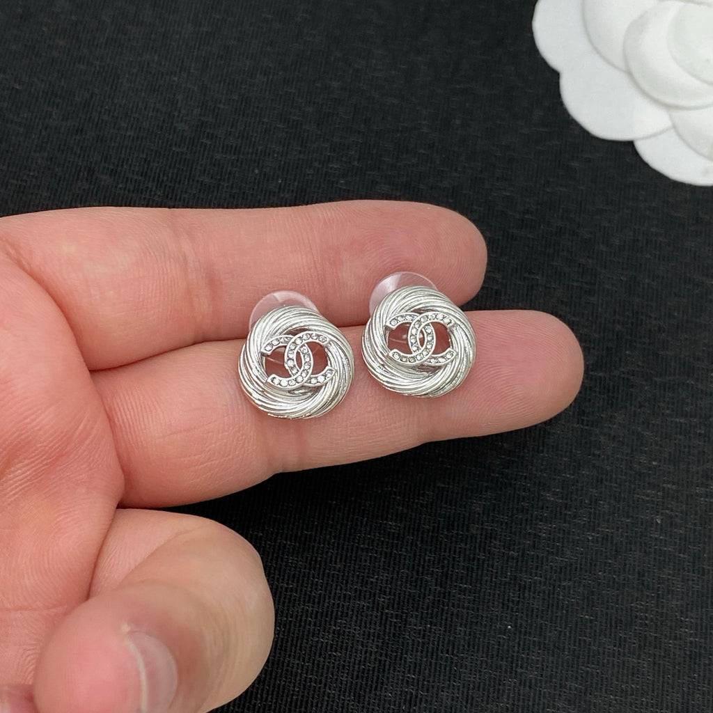 Twisted Swirl Stud Earrings–Interlocking C Pavé Center